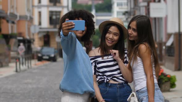 Cheerful Selfie Diverse Girls Posing on City Street