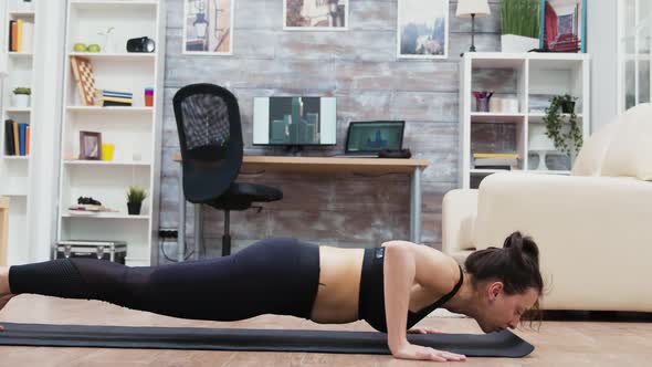 Young Woman Working Out in Living Room