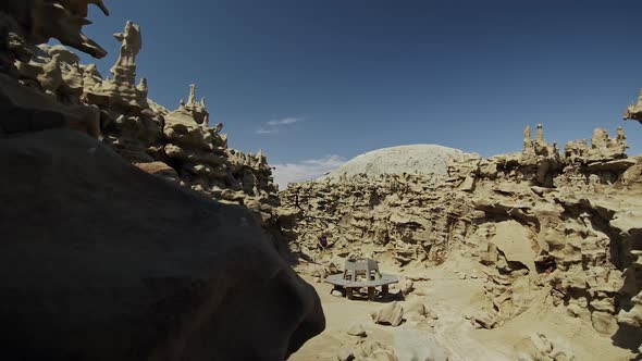 People hiking through Fantasy Canyon in the Utah desert