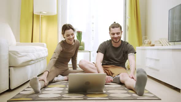 Two Friends are Relaxation and Preparing for a New Exercise