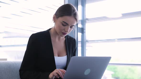 Business Woman Working On Computer At Office Center