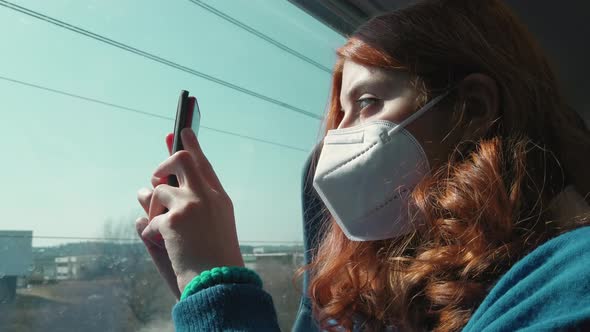 Sitting on Train Using Smartphone