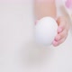 Macro a Child's Hand Holds a White Chicken Egg and Begins to Paint It Yellow - VideoHive Item for Sale