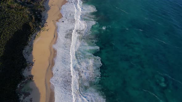 Flying along beautiful beach in Western Australia