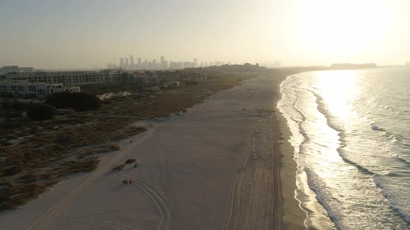 Aerial view of Dubai beach at sunset, United Arab Emirates.