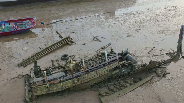 Aerial View Shipwreck Piled On The Beach.