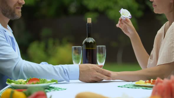 Love Confession of Middle-Aged Man on Romantic Dinner With Woman, Holding Hands