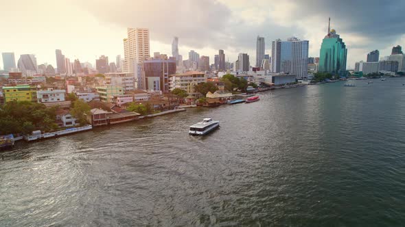 4K UHD : Aerial view over the Chao Phraya River and Buildings