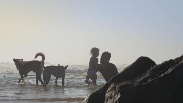 Girl Runs Up To Daddy and Man Takes Daughter in Ocean