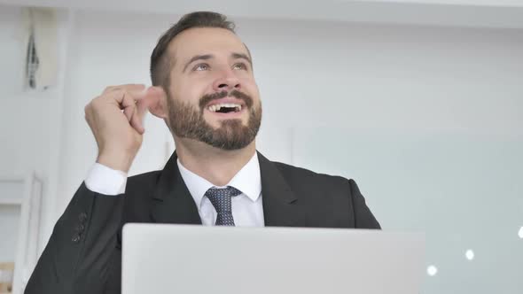 Businessman Got New Idea While Working on Laptop