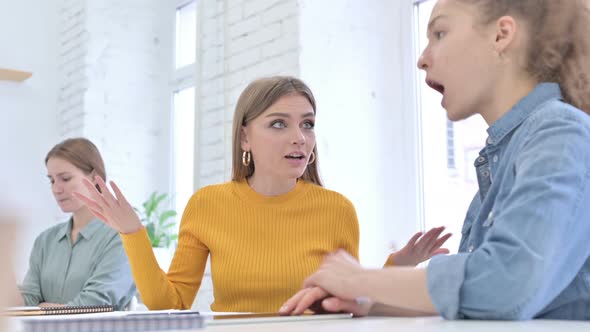 Angry Female Creative Team Having Argument in Office