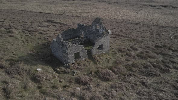 Ruins Of Abandoned Concrete Cottage In Irish Rural Landscape. The Wicklow Mountains In Ireland. aeri