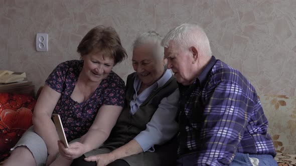 Senior people use technology