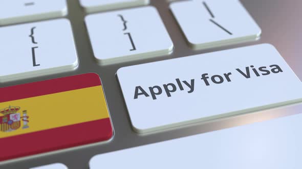 APPLY FOR VISA Text and Flag of Spain on the Computer Keyboard alt