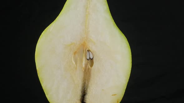 half green pear close up