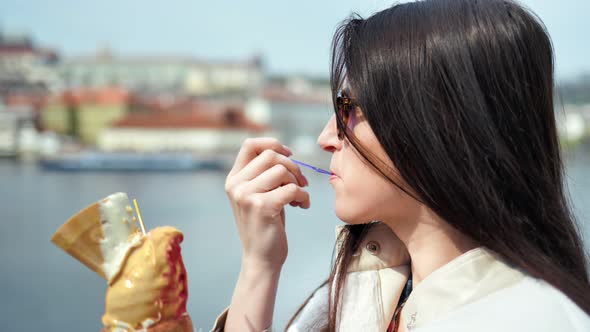 Closeup Happy Adorable Woman Enjoying Ice Cream Dessert Outdoor on Embankment Relaxing and Smiling