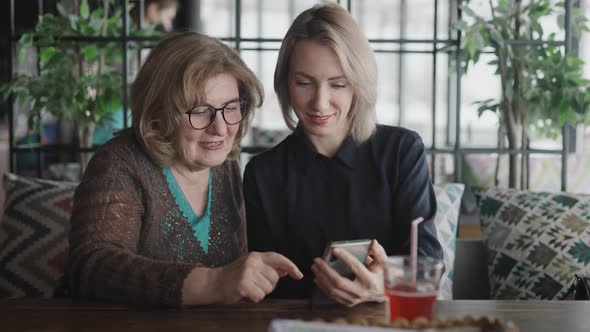 Mother and Daughter Met in a Restaurant