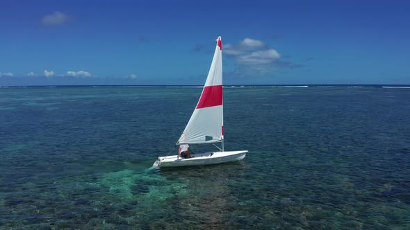 Elderly Man Sailing on Yacht at the Indian Ocean