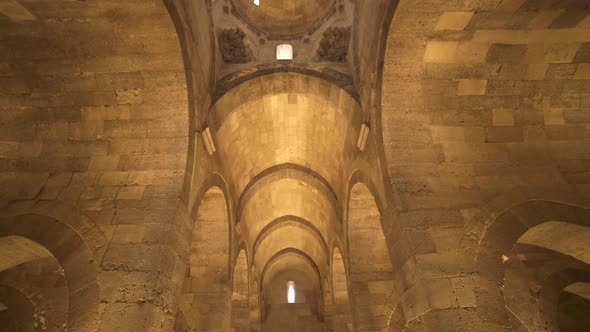 Interior of Historical Monumental Building With Stone Arches and Domes