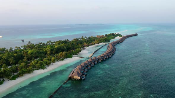 Beach bungalows at Kuredu Island, Maledives