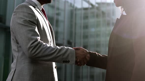 Closeup Shot of Two Business People Shaking Hands 