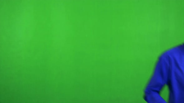 Old Senior Man Appears in Front of Camera and Smiles - Green Screen - Studio