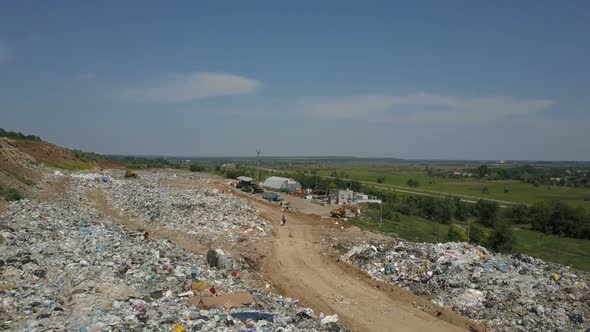 Aerial View of City Garbage Dump. Gulls Feeding on Food Waste.