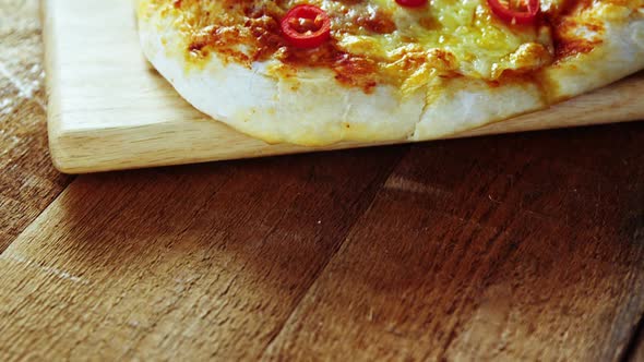 Baked pizza with jalapeno toppings