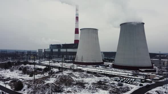 Coal fired power plant. gas emissions into the atmosphere. winter landscape. Aerial view.