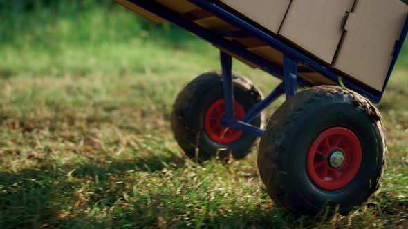 Farming Equipment Wheelbarrow Crate in Ecological Farm Area Plantation House