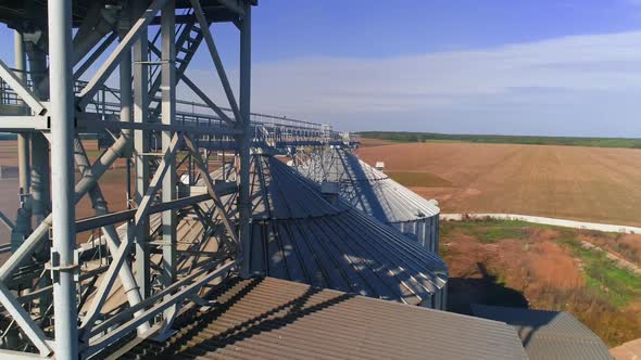 Farming elevator and granary. Storage of grain and other different cereals. Aerial view