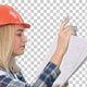 Female construction engineer reading plans, Alpha Channel - VideoHive Item for Sale