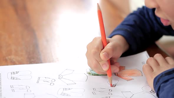 child learning at home sitting at a table stock footage