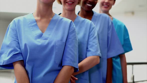 Smiling female nurses looking at camera