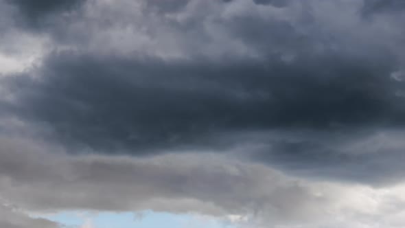 White Cumulus Clouds Rise Upward Timelapse