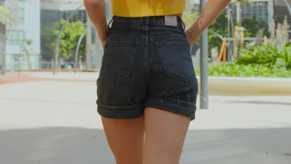 Attractive Sexy Woman in Short Denim Black Shorts