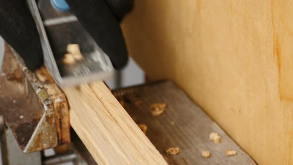 carpenter plans a wooden blank