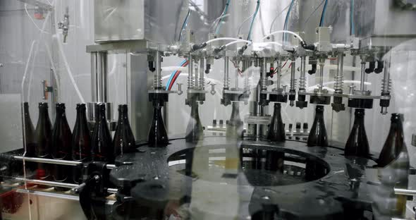 Capping Process of Full Beer Bottles