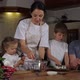 Happy Family with Three Kids is Cooking Salad at Home Together - VideoHive Item for Sale