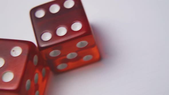 Motion Over Dices with Spots on Sides on Light Background