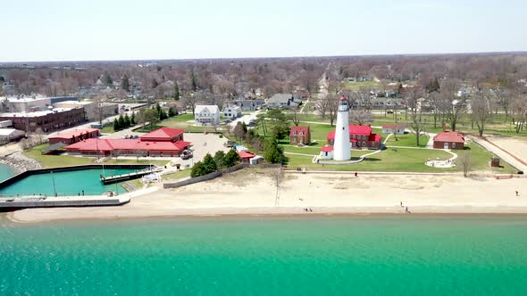 Fort Gratiot Lighthouse in Port Huron, Michigan with drone videoing sideways.