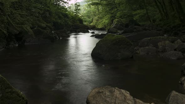 Dark River under the trees Timelapse on Gimel Les Cascades