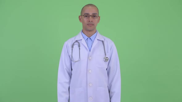 Happy Bald Multi Ethnic Man Doctor Smiling