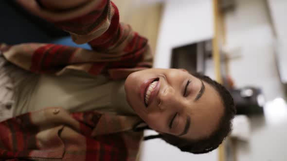 AfroAmerican Girl Taking Selfie Smiling Posing Looking at Camera at Home Alone