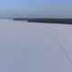 Flight Over a Taiga Forest Lake in Winter - VideoHive Item for Sale