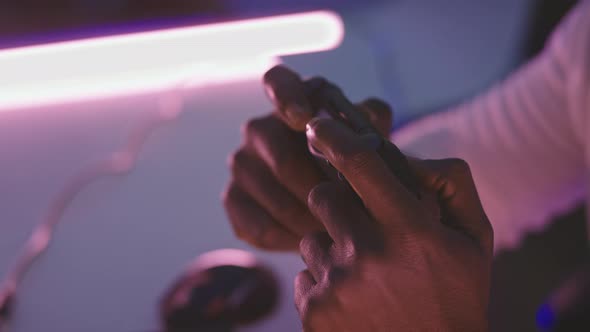 Black Man Playing Game Console Controlling Joystick. Entertainment During the Lockdown