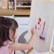 Asian young happy kid daughter coloring on painting board with mother. - VideoHive Item for Sale