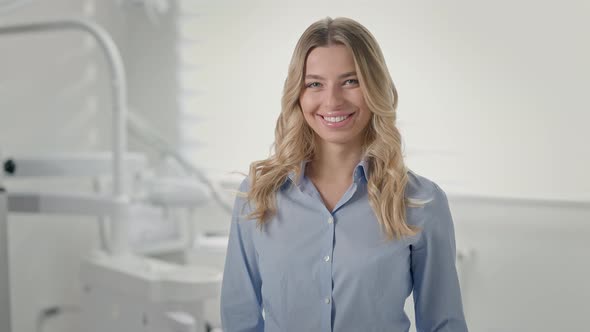 Young Girl Patient Standing In Dentists Office