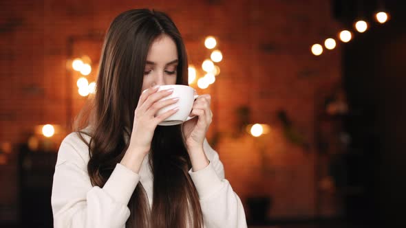 A Woman is Sitting in Her Home Office