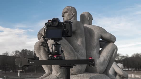 Digital Camera Moving On Right By Camera Slider Shooting Art Sculpture Of Gustav Vigeland At Frogner